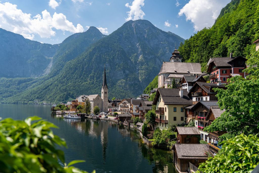 hallstatt village on water with mountains