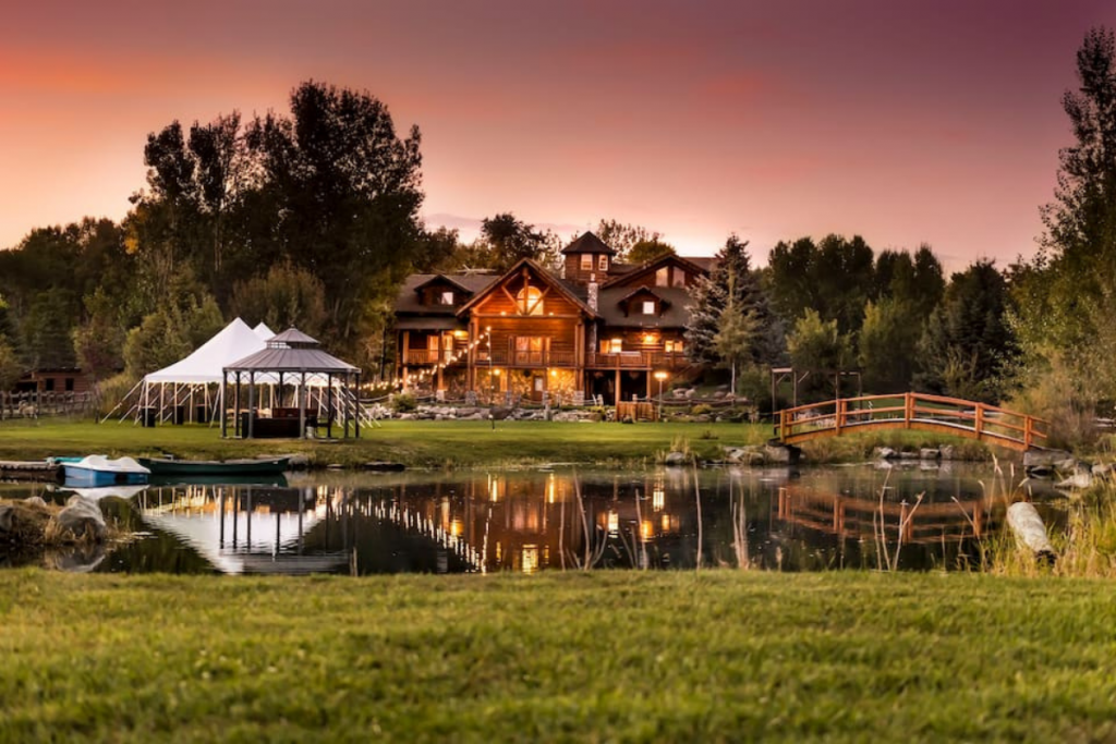 A Large Airbnb Cabin in Idaho Set on a Seven-Acre Property Complete With Water and Bridge.