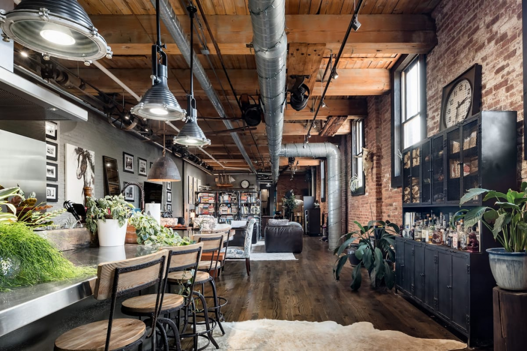 An Industrial Airbnb in Wicker Park, Chicago With Exposed Brick and Metal Piping.