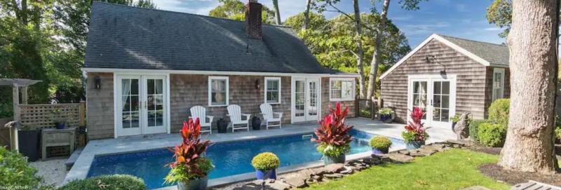 pool and exterior of a beautiful Hamptons Airbnb