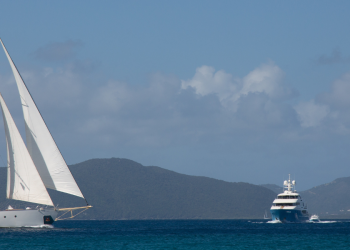 sailing yacht with sails up in the caribbean