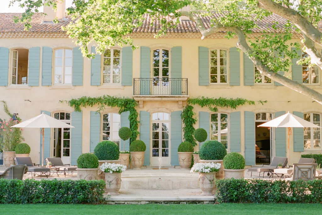 An Exterior View of the Blue and Pale Yellow Le Mas Des Poiriers, One of the Best Villas in France.