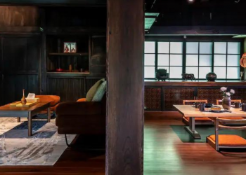 interior of an airbnb in Japan designed in a traditional japanese minimalist style with wooden elements and natural light