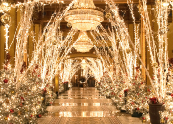 lights and holiday decorations filling the lobby of The Roosevelt New Orleans, A Waldorf Astoria Hotel