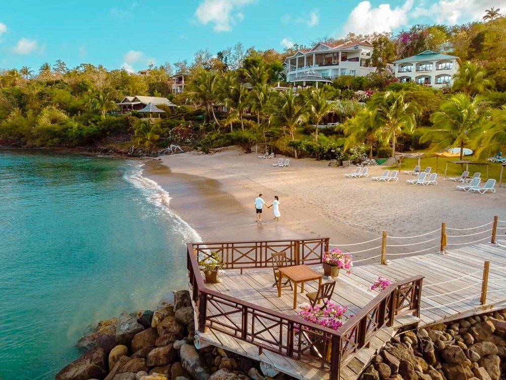 A View of the Jungle and Beach at Calabash Cove Resort and Spa, One of the Best All-Inclusive Caribbean Resorts.