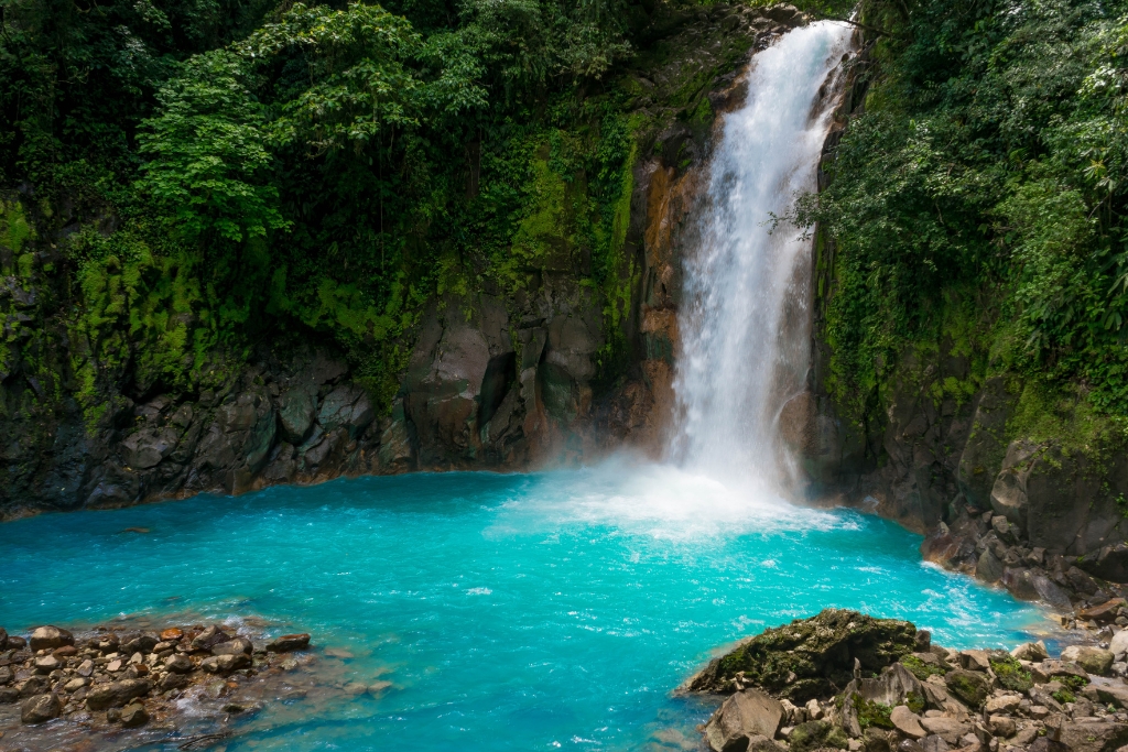 waterfall into a cave in costa rica 