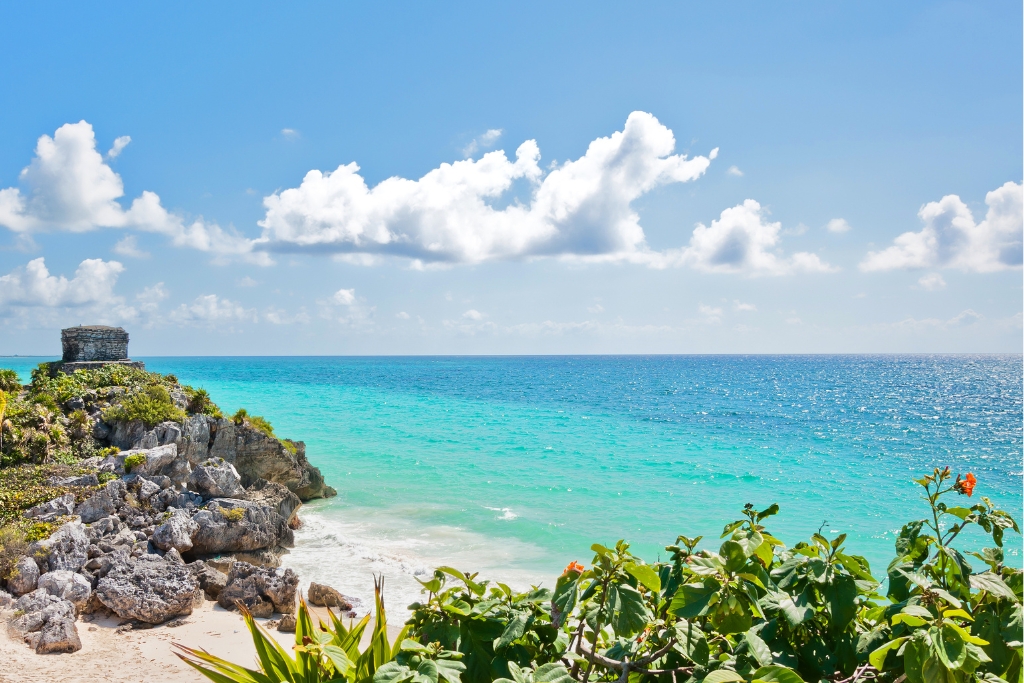 beach and ruins in tulum mexico 