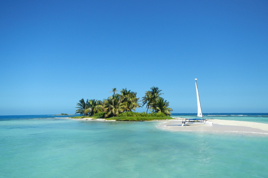 island in belize surrounded by blue water for a private retirement 