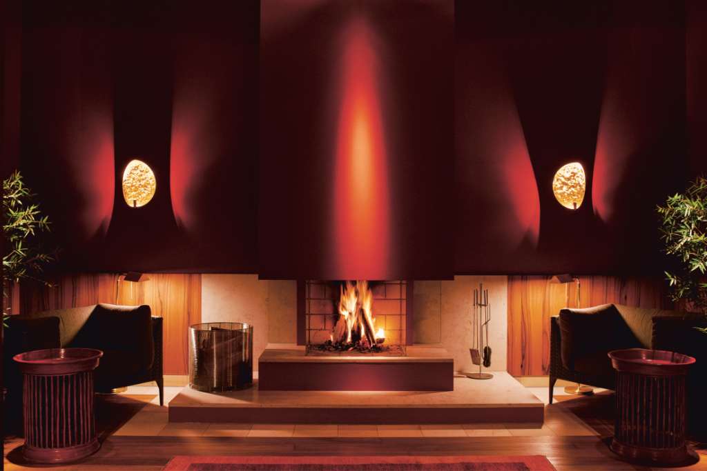 fireplace in the spa at schloss elmau in bavaria burns round the clock