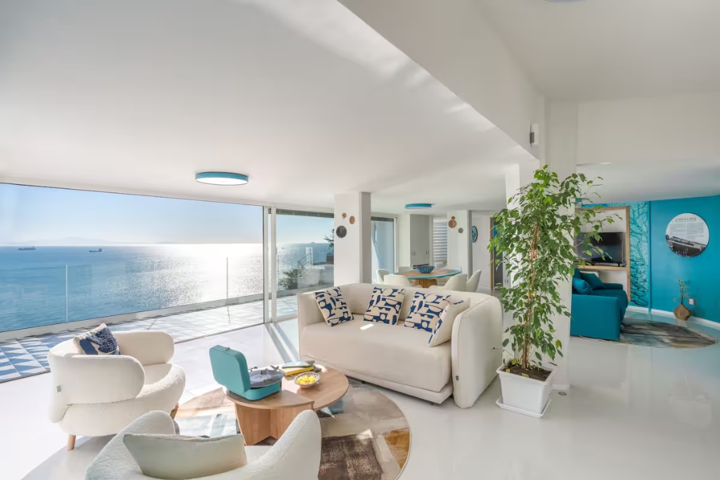 blue and white nautical living room in the amalfi coast with a view of the water