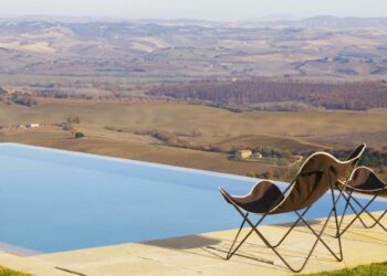 infiniti pool overlooking vineyard at a castiglion del bosco villa