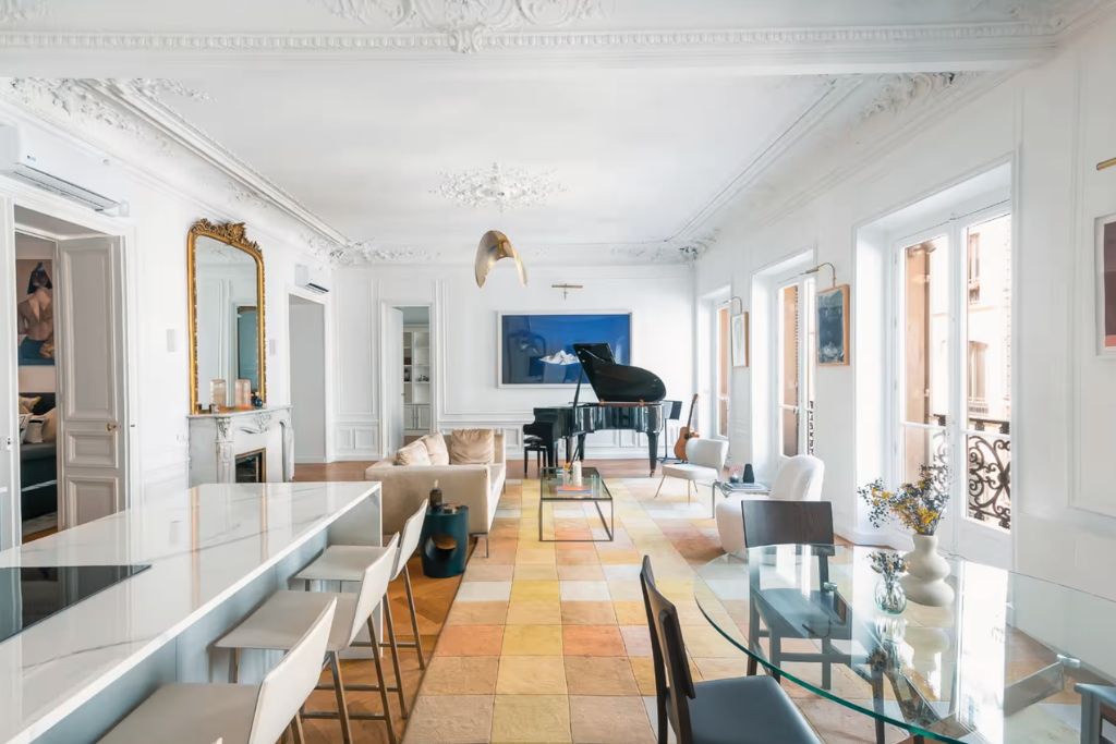 luxury condo airbnb in paris with a grand piano and large windows