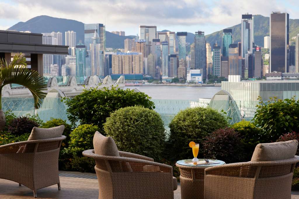 the view of hong kong island from the peninsula hong kong on the kowloon side