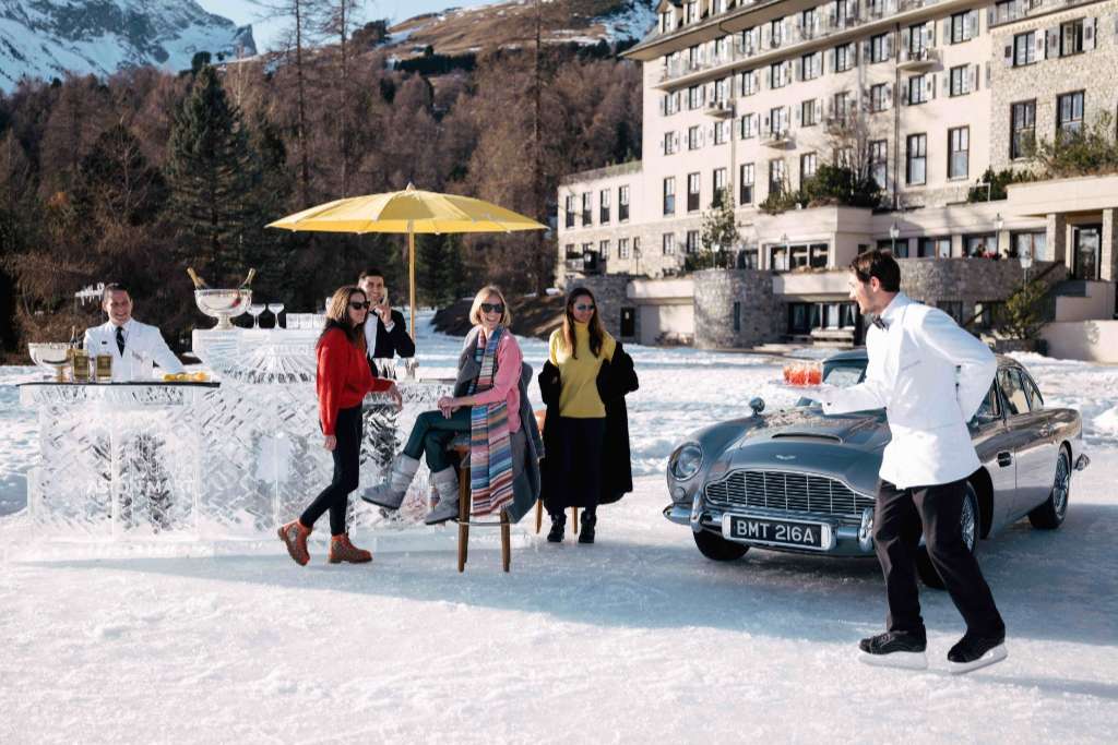 ice skating with champagne serving waiters