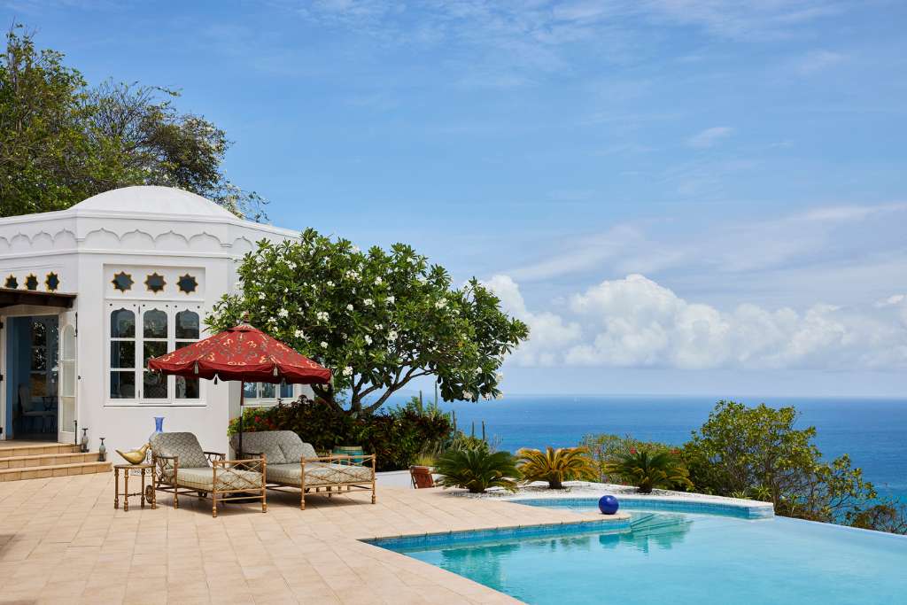 infinity pool at toucan hill overlooking the caribbean sea and atlantic ocean
