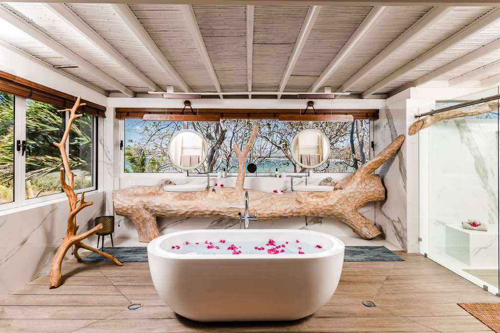deep soaking but and custom-carved vanity from mango wood at the point luxury villa in Costa Rica