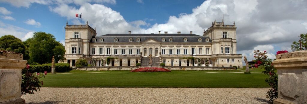 chateau ducru-beaucaillou with green grass gravel and flowers