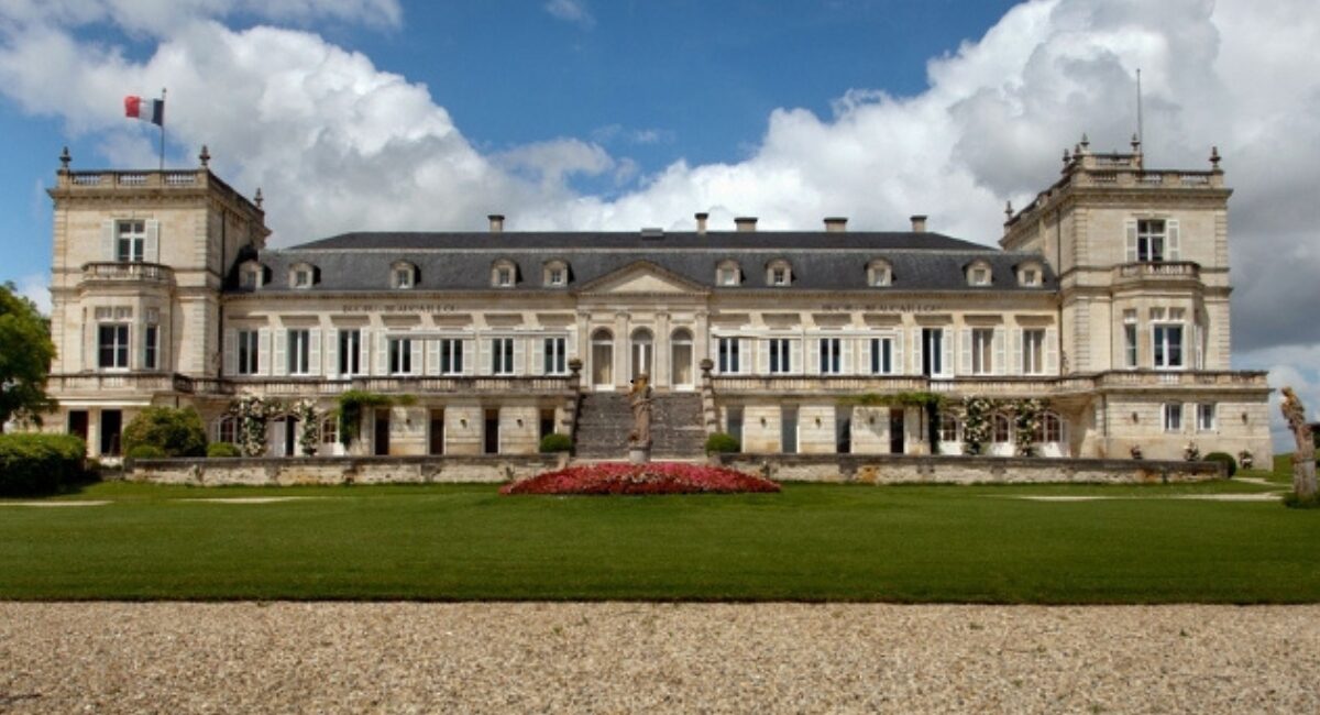 chateau ducru-beaucaillou with green grass gravel and flowers
