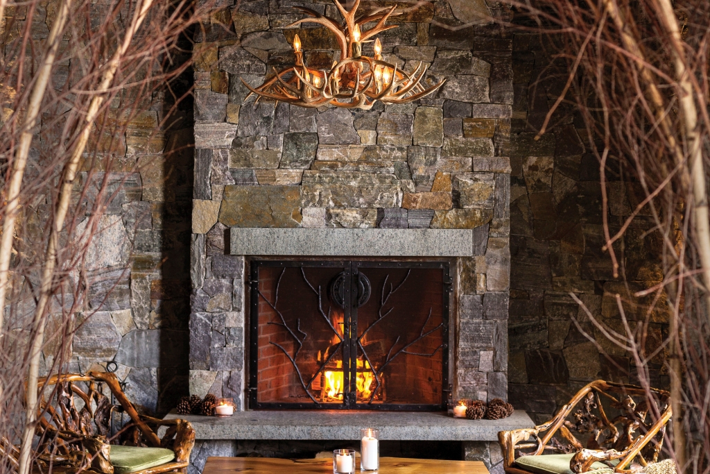 sitting area with fireplace at lake placid lodge