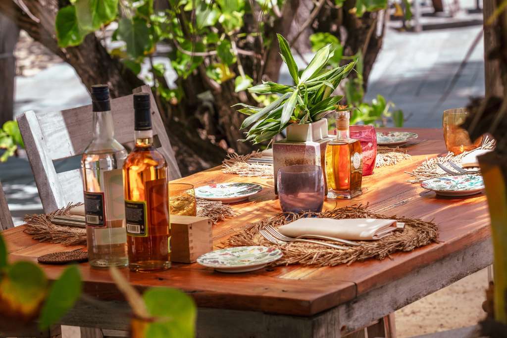 bottles or local rum grace the tables at hotel manapany st barth