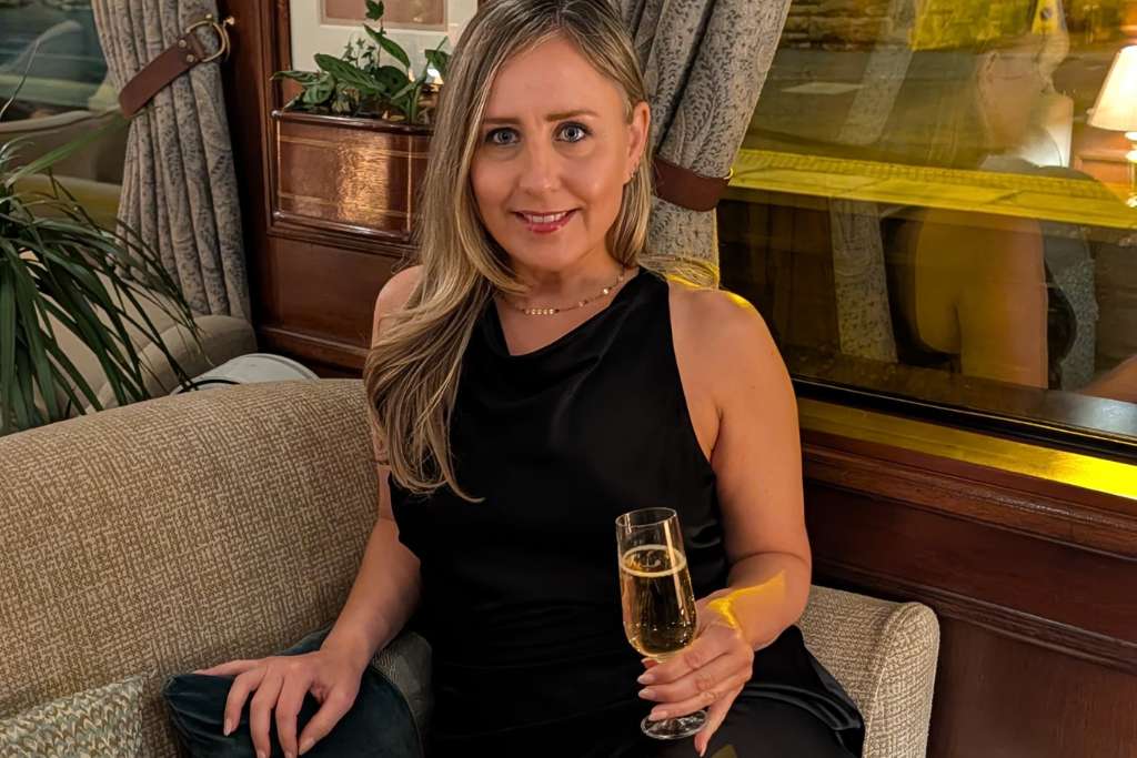 elegantly coiffed for dinner aboard the belmond royal scotsman, travel curator editor in chief deanne kaczerski