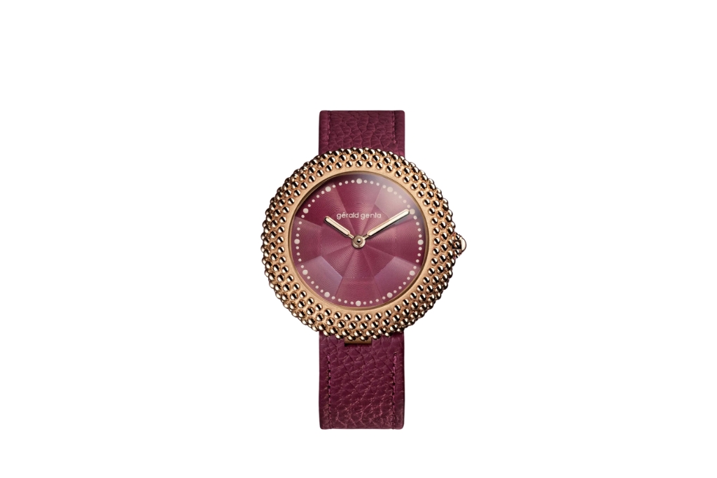 burgundy gerald genta watch with a gold rim and hands