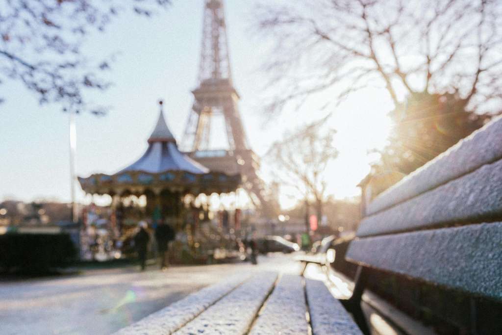 snowy eiffel tower paris