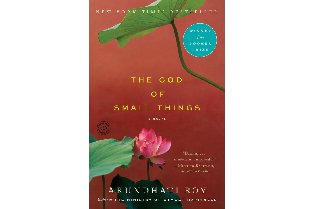 the cover of the god of small things with a red background and flowers coming from the edges