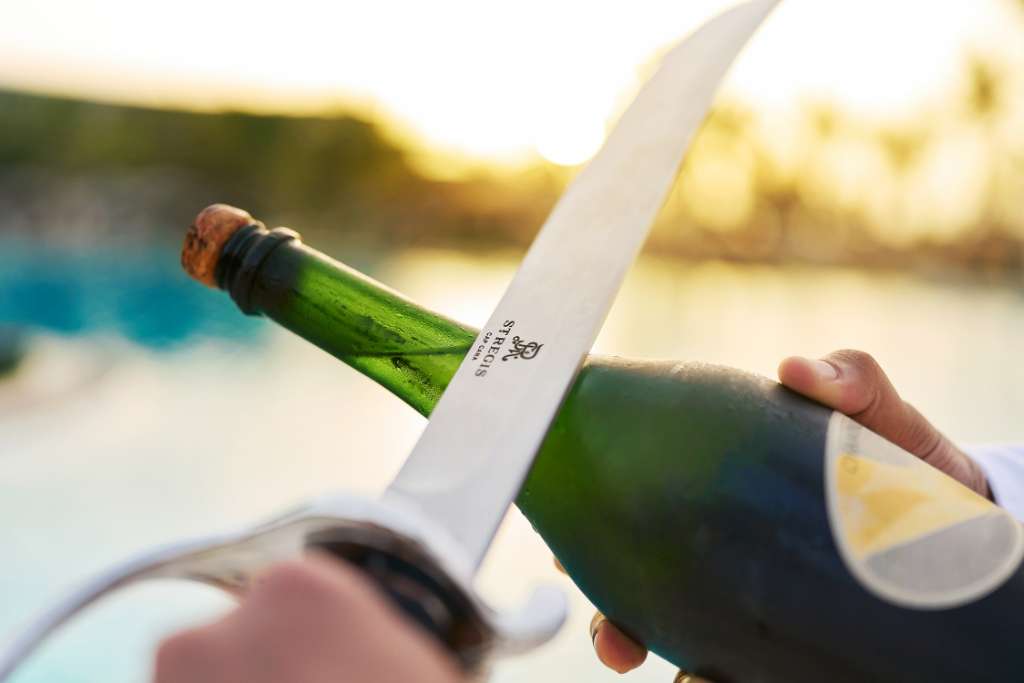nightly ritual at st regis hotels around the world, champagne sabering
