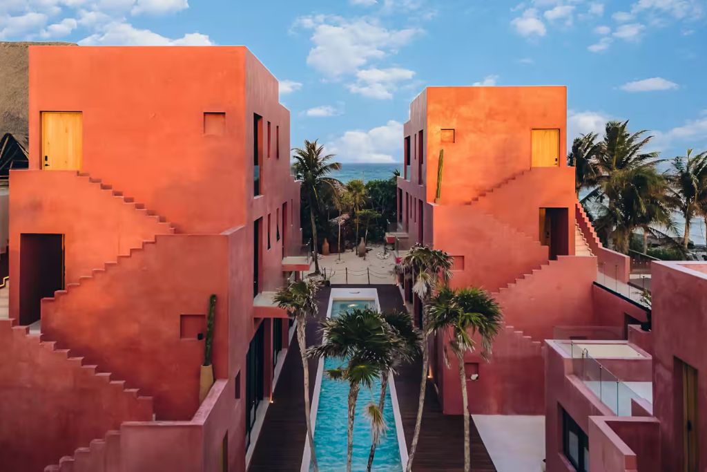 tulum mexico airbnb pool and terracota facade 