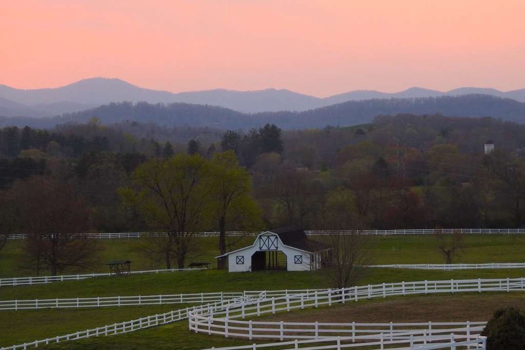 the horse shoe farm set against north carolilna's blue ridge mountains