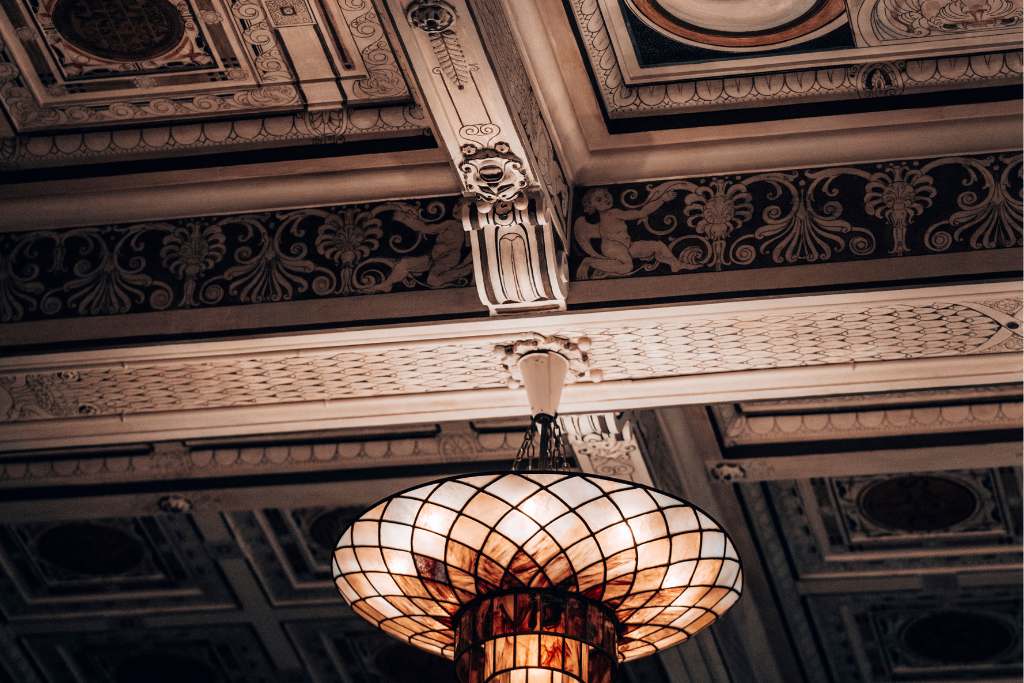 old-bank details are evident in the ceiling of the corinthia rome