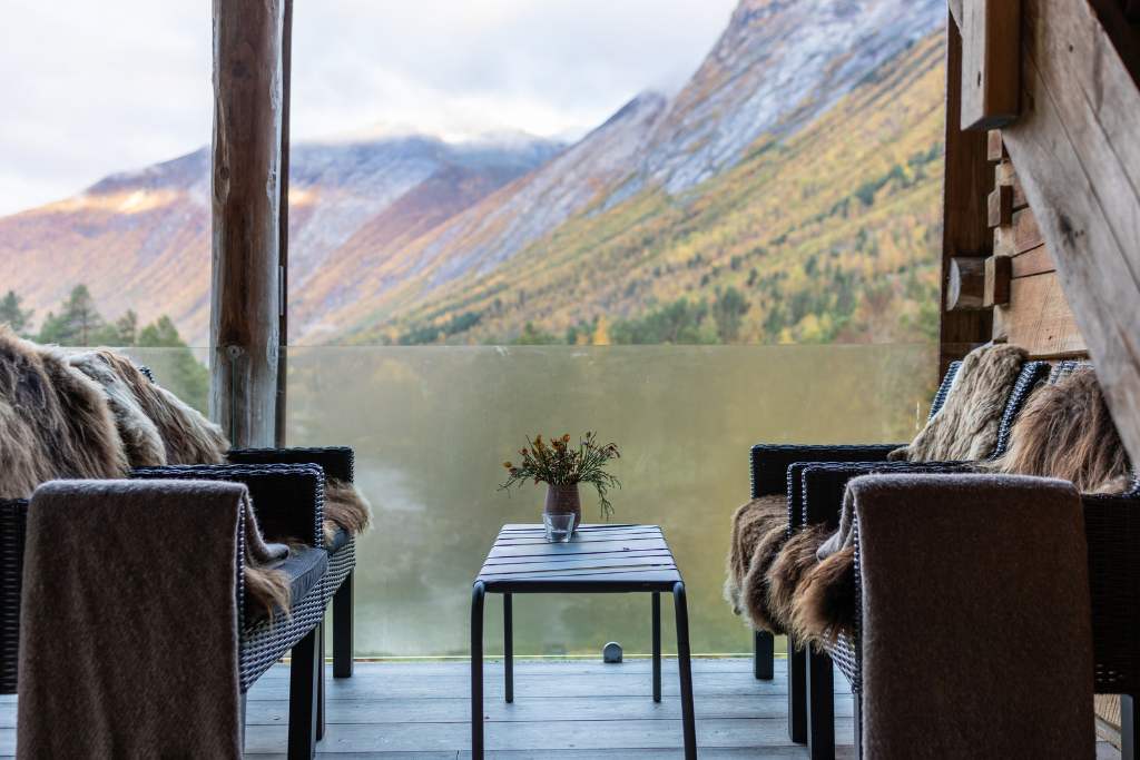 picturesque cabin with fur chairs at juvet norway