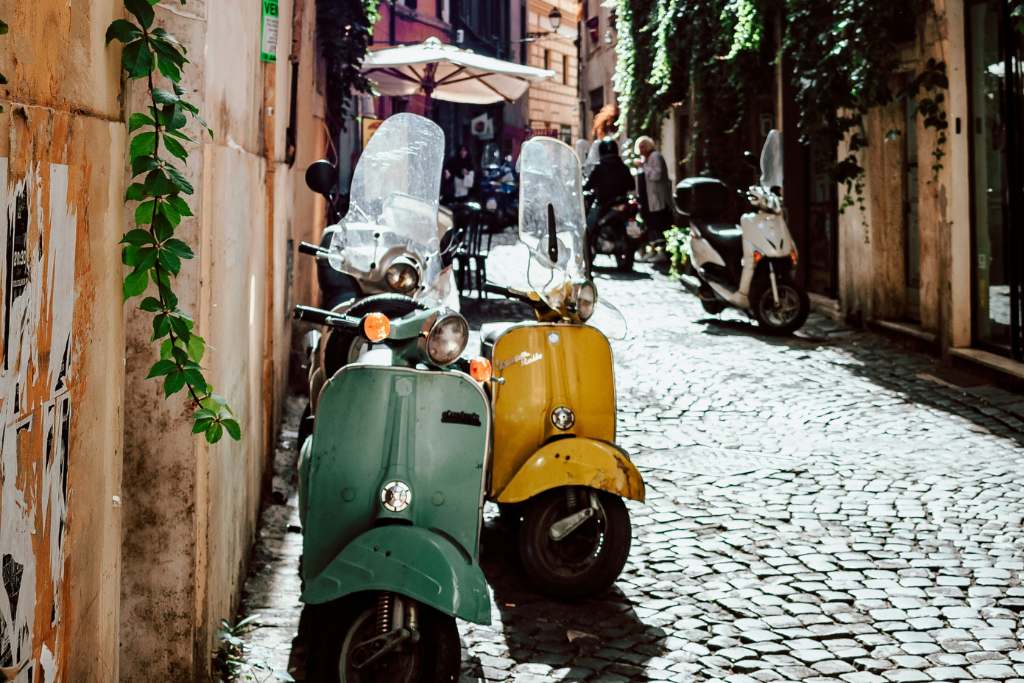 vespas in the street of rome