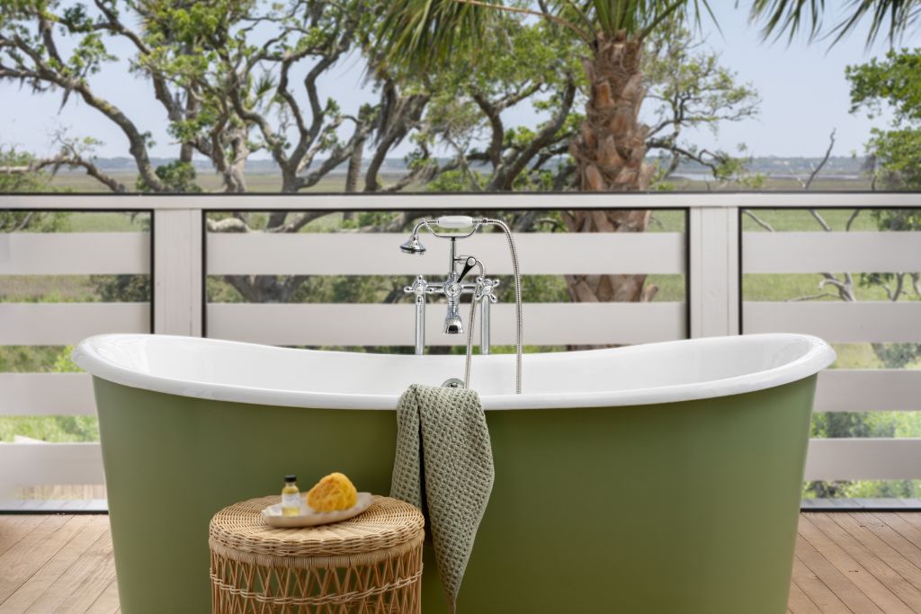 private outdoor tubs on the verandah at dunlin an auberge resort