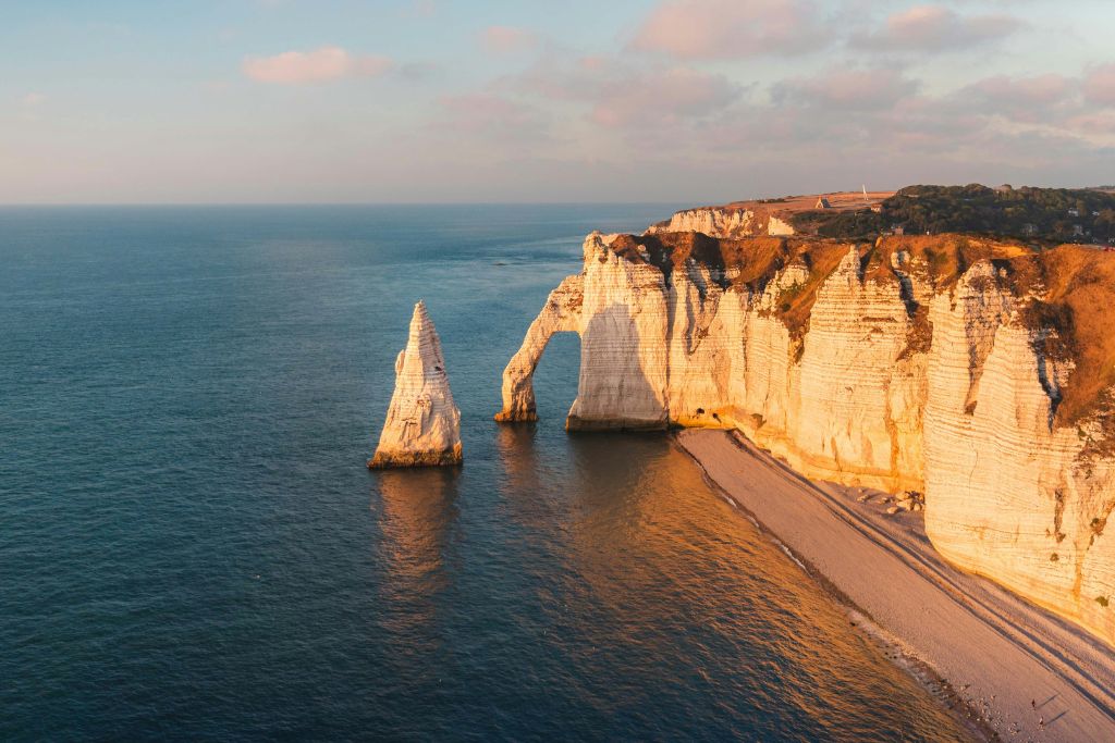 normandy beach and stunning cliffs at sunrise