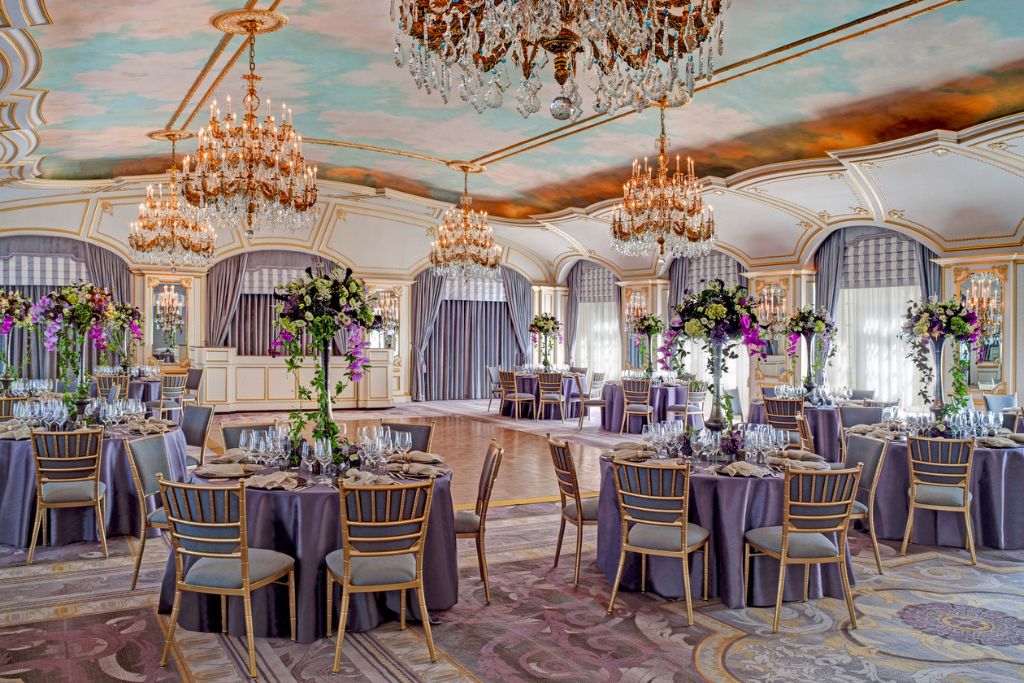 st. regis hotel purple and gold ballroom with gorgeous chandeliers