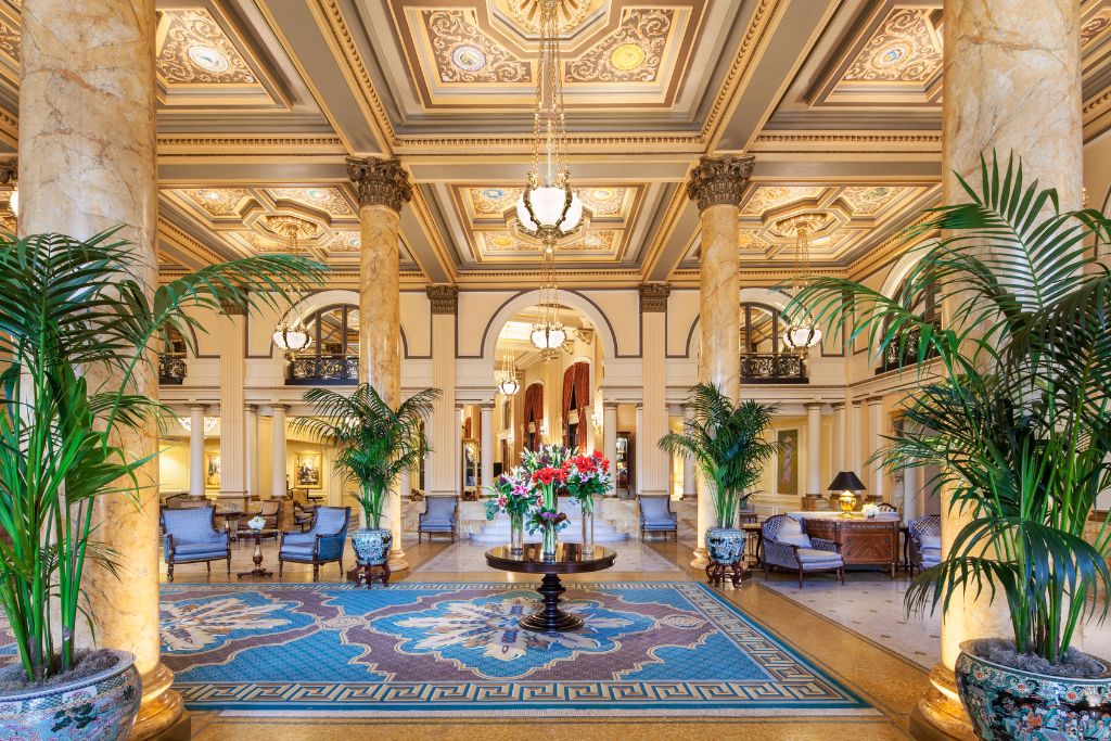 willard intercontinental lobby with marble columns and blue upholstery
