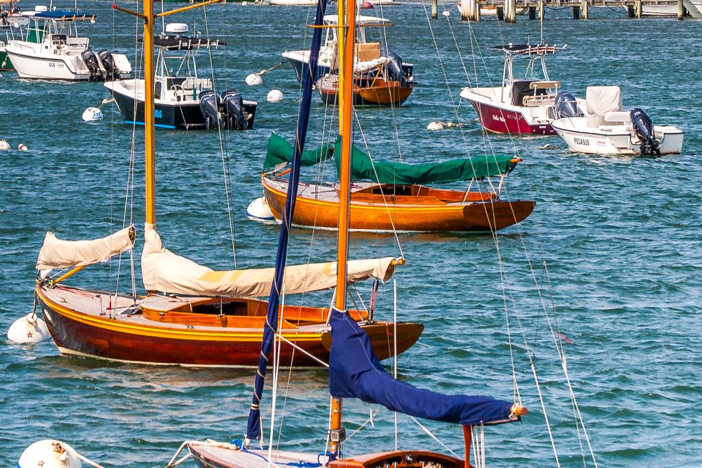 wooden sailboats out on the water in nantucket