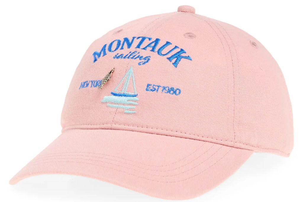 pink baseball cap with blue embroidery