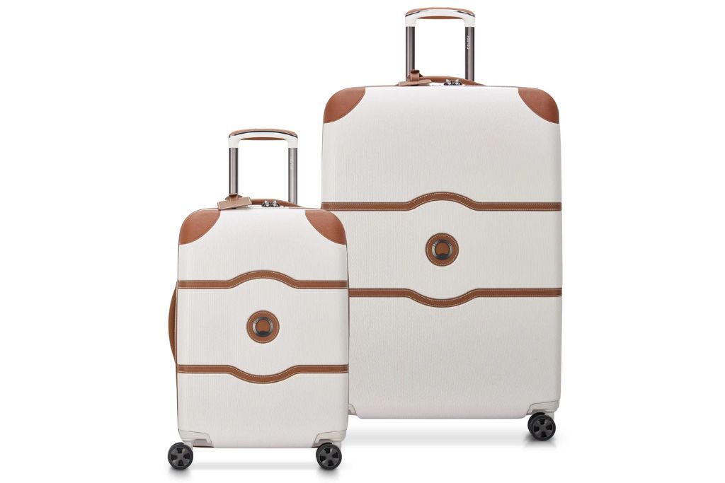 two piece white luggage set with brown accents