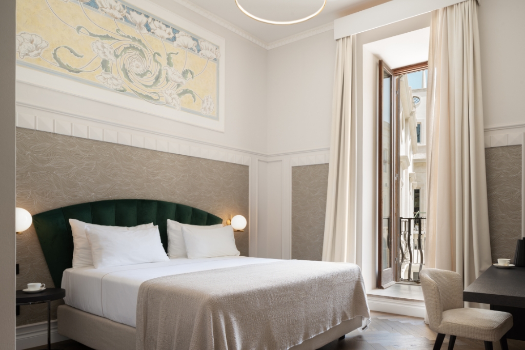 guest room with wide terrace, palace patria, lecce italy