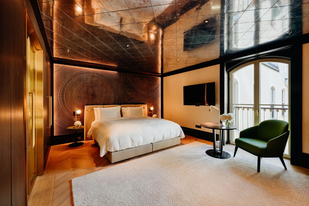 almanac palais vienna deluxe room with mirrored ceiling textured design backboard and balcony