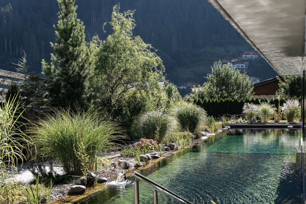 hotel nesslerhof natural pool and forest view