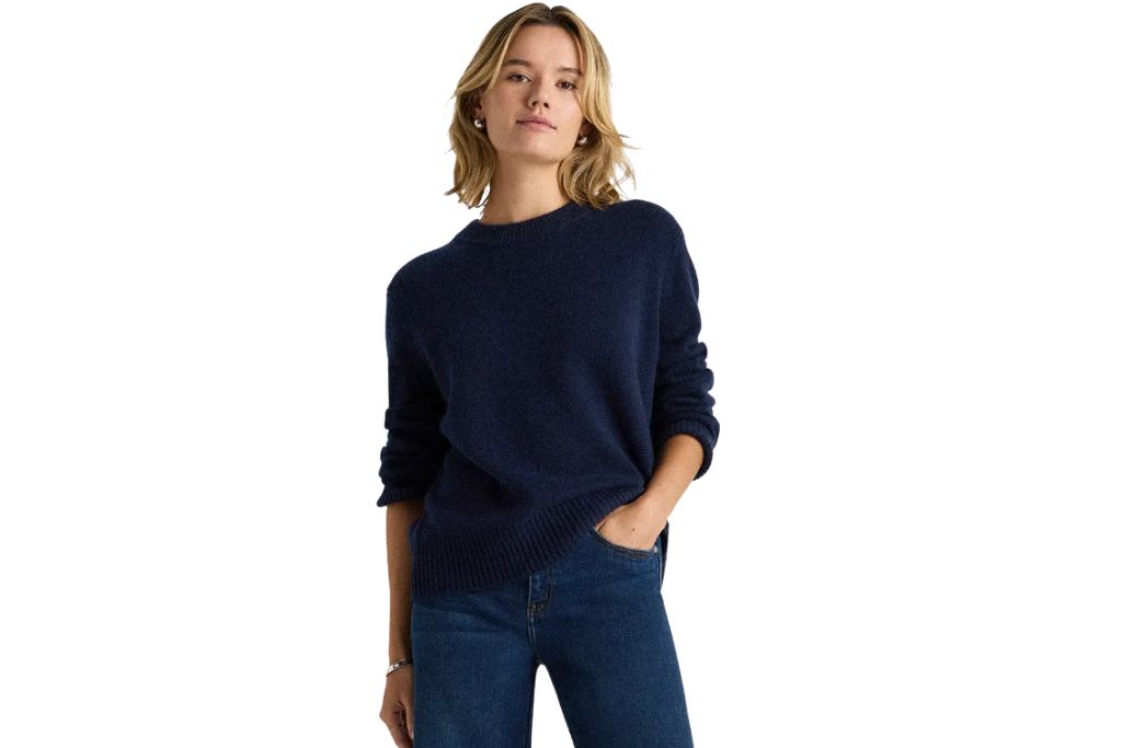 person wearing navy cashmere sweater