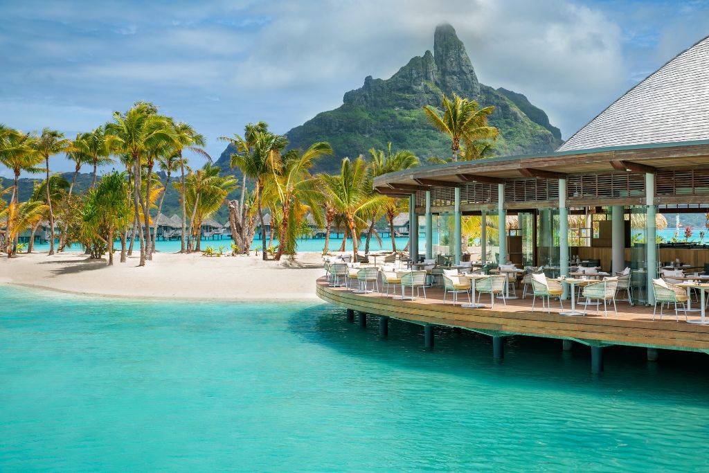 resort view of beach, dining and mountain